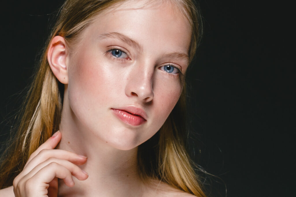 Beautiful Blonde Woman Beauty Model Girl with perfect makeup ove